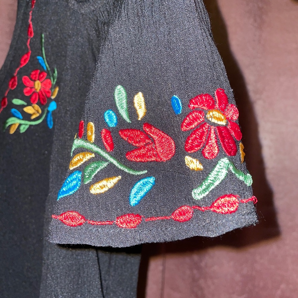 Black blouse with handmade details